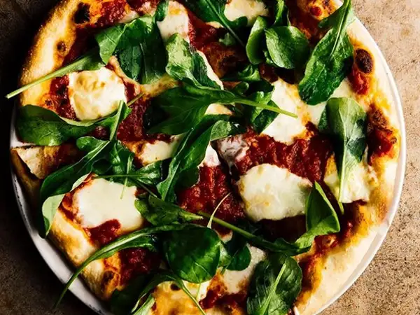 Spicy San Marzano pizza with fresh arugula